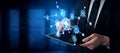 Man in Business Suit Interacting with Virtual Cloud Technology and Data Icons on Tablet Device in Modern Digital Royalty Free Stock Photo