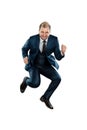 A man in a business suit, a joyful businessman jumped up. Isolated on a white background