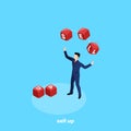 A man in a business suit juggles with cubes with letters