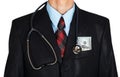 Man in a business suit with a stethoscope and money in pocket