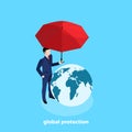 A man in a business suit under a red umbrella and next to him a globe Royalty Free Stock Photo