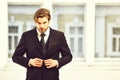 Man or businessman with serious face in black jacket, tie Royalty Free Stock Photo