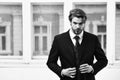 Man or businessman with serious face in black jacket, tie Royalty Free Stock Photo