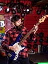 Man with busy face holds guitar, play music, Royalty Free Stock Photo