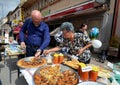 Man buy traditional homemade pastry called gomleze during festival Prespa apple picking 20
