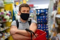 Man Buyer wearing a protective mask.