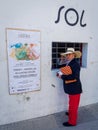 Man Buying Bull Ring Ticket in Spain