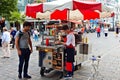 A man buying a hot dog in Kropeliner Strasse street in Rostock, German