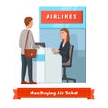 Man buying ticket for business trip at the airport Royalty Free Stock Photo