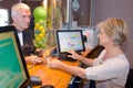 Man buying ticket at counter Royalty Free Stock Photo