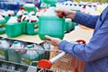 Man buys nonfreezing liquid in shop Royalty Free Stock Photo