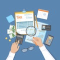 Man calculates tax. Payment of tax, accounts, bills concept. Financial calendar, money, tax form on clipboard, magnifying glass