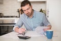 Man calculating bills and tax expenses Royalty Free Stock Photo