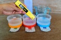 The man calibrate Ph meter before use