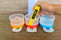 The man calibrate Ph meter