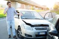 Man calling help after car crash accident on the road Royalty Free Stock Photo