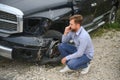 Man calling help after a car crash accident on the road Royalty Free Stock Photo