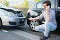 Man calling help after car crash accident on the road Royalty Free Stock Photo