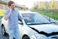 Man calling help after car crash accident on road Royalty Free Stock Photo