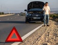 Man Calling for Help Beside Car With Open Hood on Highway Royalty Free Stock Photo