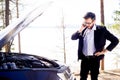 Man calling roadside assistance Royalty Free Stock Photo