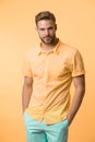 Man on calm face posing confidently with hands in pockets. Man look attractive in casual linen shirt. Guy fashion model Royalty Free Stock Photo