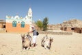 Man with camels in desert Royalty Free Stock Photo