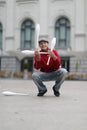 A man in a cap demonstrates maces Royalty Free Stock Photo