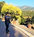 A Man is Capturing a Beauty of Nature having Beautiful Mountains