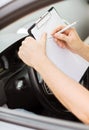 Man with car documents Royalty Free Stock Photo