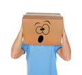 Man with cardboard box on his head and frightened emoticon face