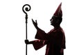 Man cardinal bishop silhouette saluting blessing
