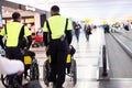 Man caretaker pushing elderly people in wheelchair in the airport.