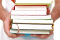 Man carries books Royalty Free Stock Photo