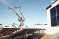 Man carries ladder during solar panels installation Royalty Free Stock Photo