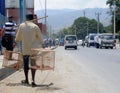 Man Carrying Birds