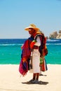 Man Carrying Blankets in Cabo San Lucas, Mexico Royalty Free Stock Photo