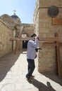 Man carrying cross in Jerusalem. Israel Royalty Free Stock Photo