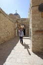 Man carrying cross in Jerusalem Old town. Israel Royalty Free Stock Photo