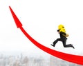 Man carrying Euro sign running on red arrow up graph Royalty Free Stock Photo