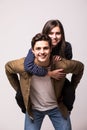 Man carrying girlfriend on his back Royalty Free Stock Photo