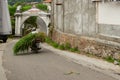 A man is carrying grass for animal feed on a motorbike, is a local resident on the hiking trail of Mount Merapi