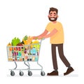 Man is carrying a grocery cart full of groceries in the supermarket. Vector illustration