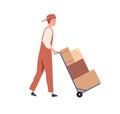 Man carrying heavy goods in cardboard boxes on dolly. Carrier with cargo on delivery trolley. Loader, warehouse worker Royalty Free Stock Photo