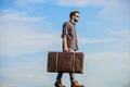 Man carrying his things in baggage. Business trip. Handsome guy traveler. Travel with luggage. Vacation time. Guy