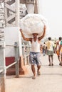 Man carrying load on the Howrah Bridge Royalty Free Stock Photo