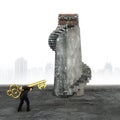 Man carrying pound symbol key toward treasure chest