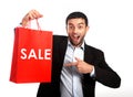 Man carrying a red sale shopping bag Royalty Free Stock Photo