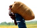 A man carrying sack bag