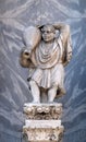 Man carrying a wine jug, detail of the facade of the Saint Mark`s Basilica Royalty Free Stock Photo